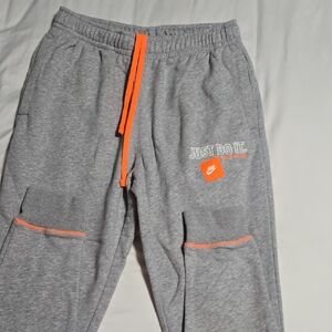 Nike Kids Gray Sweatpants with Orange Details